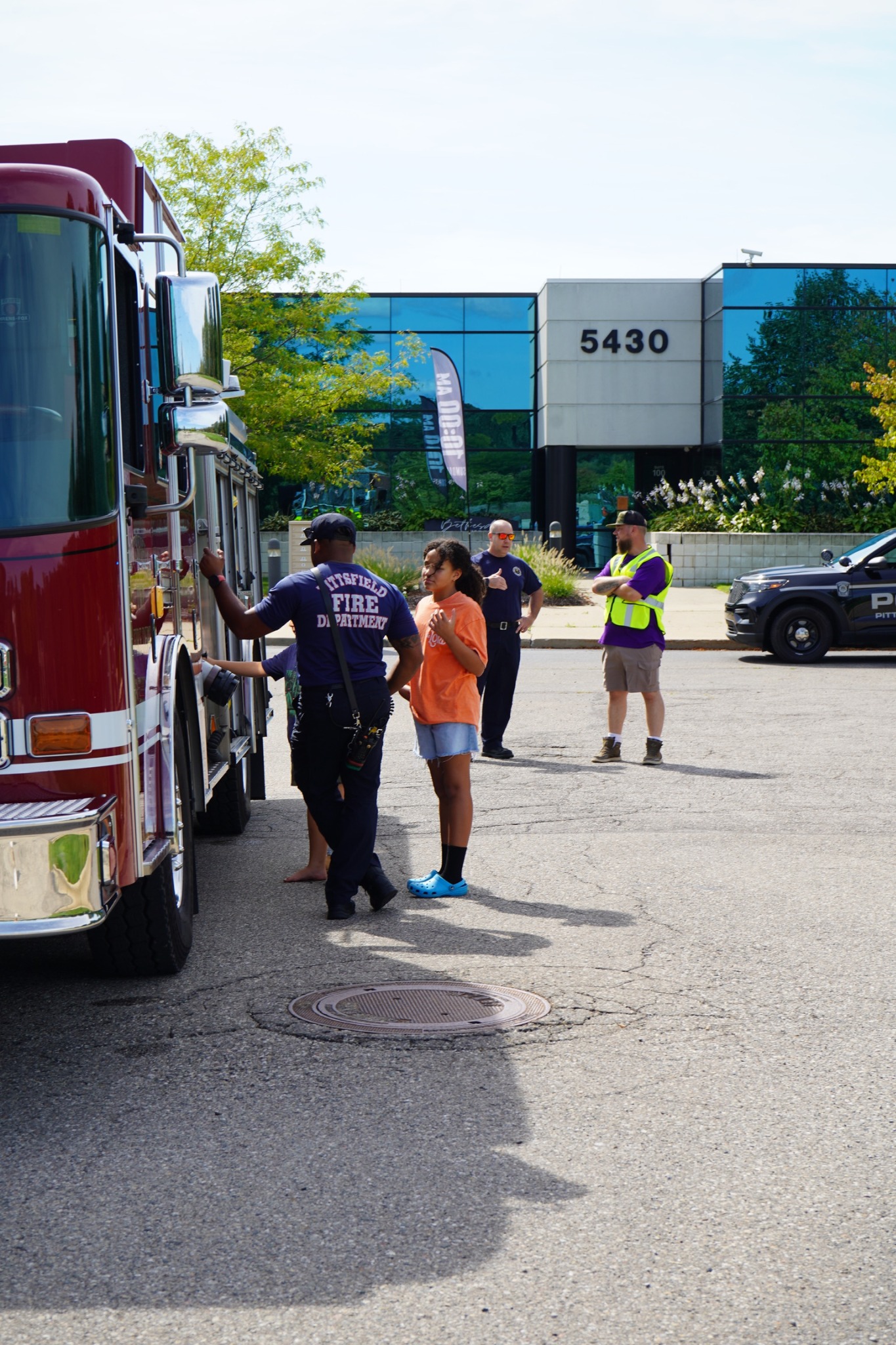 Visitors exploring a fire truck outside Bethesda Church.